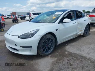 2023 Tesla Model 3 with VIN 5YJ3E1EA5PF407054, listed as a IAAI auction lot 42313770 with 57,621 mi miles and . Bid and sale history available at DreamBid. Image 17.