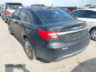 2014 Chrysler 200 Touring with VIN 1C3CCBBBXEN153420, listed as a IAAI auction lot 42084600 with 215,209 mi miles. Bid and sale history available at carsss.com. Image 3.