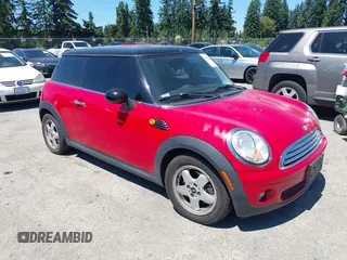 2007 MINI Hardtop with VIN WMWMF33577TT58789, listed as a IAAI auction lot 42677653 with 113,830 mi miles and . Bid and sale history available at DreamBid. Image 1.