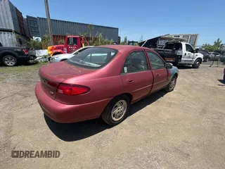 2000 Ford Escort Fleet z VIN 3FAFP13PXYR258385, wystawiony jako Copart lot #57472665 z przebiegiem 79 947 mil mil oraz Tytuł czysty. Historia ofert i sprzedaży dostępna na DreamBid. Obrazek 4.