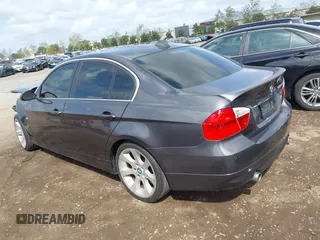 2007 BMW 3 Series 335xi with VIN WBAVD53577A006071, listed as a IAAI auction lot 41924859 with 128,693 mi miles. Bid and sale history available at carsss.com. Image 3.