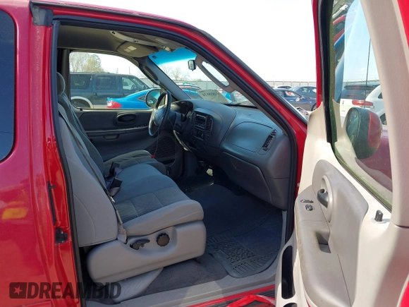 2003 Ford F-150 XL with VIN 2FTRX18L13CA49907, listed as a IAAI auction lot 41888674 with 132,944 mi miles. Bid and sale history available at carsss.com. Image 5.