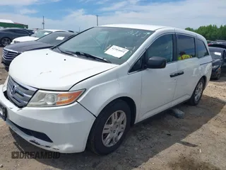 2012 Honda Odyssey LX z VIN 5FNRL5H28CB096385, wystawiony jako IAAI lot #42304664 z przebiegiem 105 010 mil mil oraz . Historia ofert i sprzedaży dostępna na DreamBid. Obrazek 2.