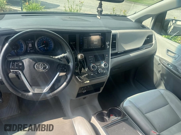 2015 Toyota Sienna XLE with VIN 5TDYK3DC5FS567460, listed as a Copart auction lot 63311295 with 296,433 mi miles and Clean title. Bid and sale history available at DreamBid. Image 9.