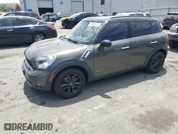 2011 MINI Countryman S with VIN WMWZC5C5XBWL55516, listed as a Copart auction lot 63239235 with 137,545 mi miles and Salvage title. Bid and sale history available at DreamBid. Image 1.