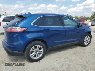 2020 Ford Edge SEL with VIN 2FMPK4J9XLBA11714, listed as a Copart auction lot 60585555 with 101,593 mi miles and Salvage title. Bid and sale history available at DreamBid. Image 3.