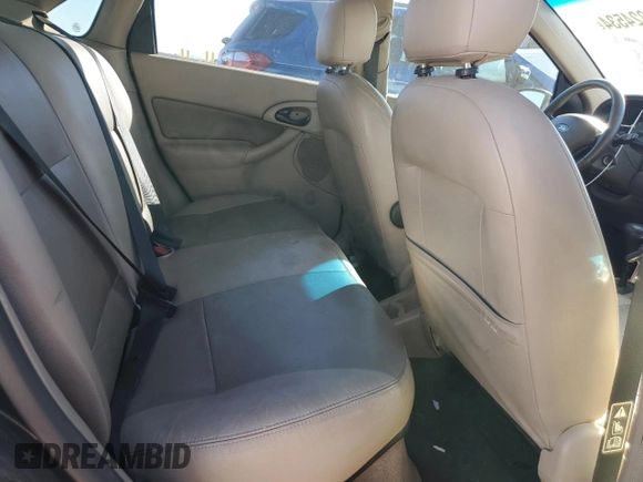 2003 Ford Focus ZTS with VIN 1FAFP38333W249101, listed as a Copart auction lot 77824534 with 163,513 mi miles and Salvage Title. Bid and sale history available at carsss.com. Image 10.