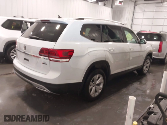 2018 Volkswagen Atlas SE with VIN 1V2KR2CA7JC574270, listed as a IAAI auction lot 41654110 with 104,440 mi miles and . Bid and sale history available at DreamBid. Image 4.