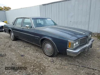 1985 Oldsmobile Delta Royale z VIN 1G3BN69YXF9080322, wystawiony jako Copart lot #78670094 z przebiegiem 58 231 mil mil oraz Tytuł czysty. Historia ofert i sprzedaży dostępna na DreamBid. Obrazek 4.