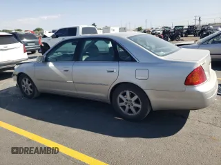 2000 Toyota Avalon XL with VIN 4T1BF28B7YU112576, listed as a Copart auction lot 59726505 with 242,412 mi miles and Salvage title. Bid and sale history available at DreamBid. Image 2.