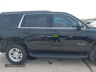 2019 Chevrolet Tahoe LT z VIN 1GNSCBKC0KR275635, wystawiony jako IAAI lot #42071241 z przebiegiem 158 621 mil mil oraz . Historia ofert i sprzedaży dostępna na DreamBid. Obrazek 13.