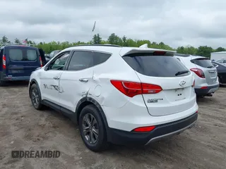 2014 Hyundai Santa Fe z VIN 5XYZUDLB9EG227009, wystawiony jako IAAI lot #42272191 z przebiegiem 97 474 mil mil oraz . Historia ofert i sprzedaży dostępna na DreamBid. Obrazek 3.