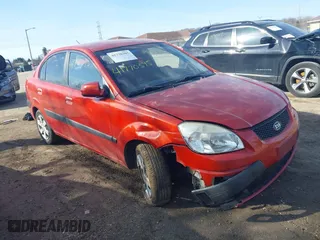 2008 Kia Rio LX with VIN KNADE123486387187, listed as a IAAI auction lot 41770395 with 113,663 mi miles. Bid and sale history available at carsss.com. Image 1.