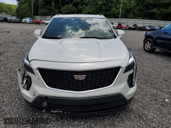 2019 Cadillac XT4 FWD Sport with VIN 1GYFZER44KF210582, listed as a Copart auction lot 61272015 with 104,073 mi miles and Salvage title. Bid and sale history available at DreamBid. Image 5.
