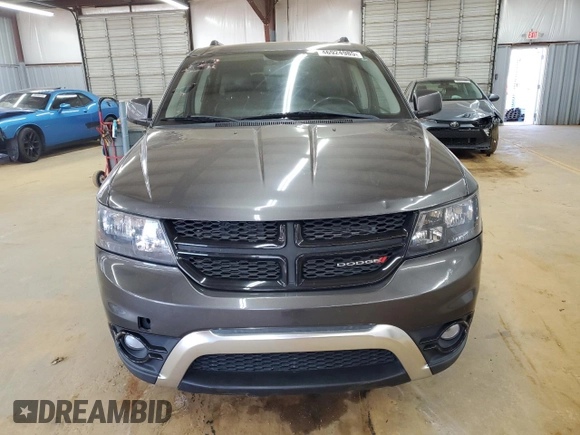 2014 Dodge Journey Crossroad with VIN 3C4PDCGG8ET284320, listed as a Copart auction lot 46924985 with 192,321 mi miles and Salvage title. Bid and sale history available at DreamBid. Image 5.