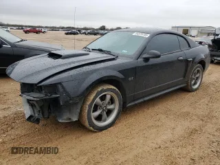2002 Ford Mustang GT Deluxe with VIN 1FAFP42X42F214888, listed as a Copart auction lot 44379755 with 77,207 mi miles and Salvage Title. Bid and sale history available at carsss.com. Image 1.
