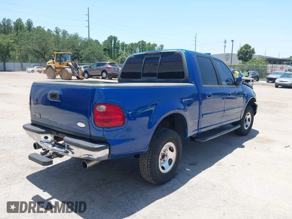 2001 Ford F-150 XLT with VIN 1FTRW07W01KE90204, listed as a IAAI auction lot 42289853 with Not provided miles and . Bid and sale history available at DreamBid. Image 4.