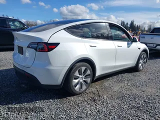 2021 Tesla Model Y Standard Range with VIN 5YJYGDED9MF110697, listed as a IAAI auction lot 41707730 with Not Provided miles and . Bid and sale history available at carsss.com. Image 4.