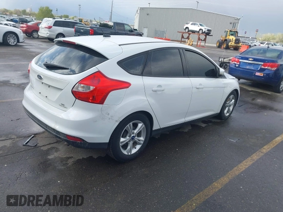 2014 Ford Focus SE with VIN 1FADP3K21EL219834, listed as a IAAI auction lot 41995901 with 172,409 mi miles. Bid and sale history available at carsss.com. Image 4.