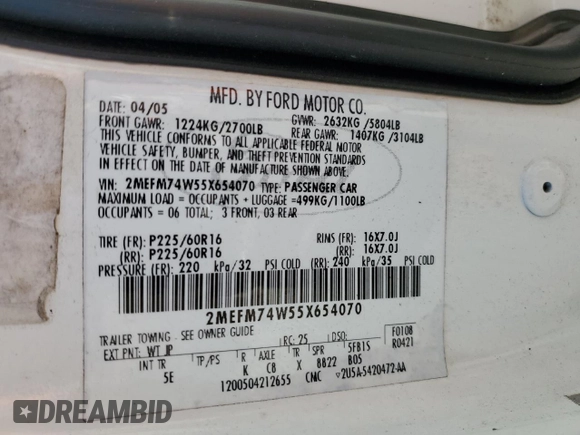 2005 Mercury Grand Marquis GS with VIN 2MEFM74W55X654070, listed as a Copart auction lot 53114785 with 56,128 mi miles and Salvage Title. Bid and sale history available at DreamBid. Image 14.