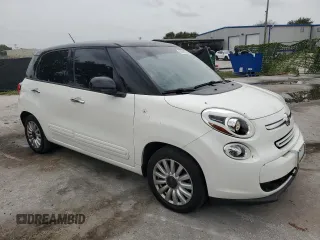 2014 FIAT 500L Easy with VIN ZFBCFABH0EZ000672, listed as a Copart auction lot 62691854 with 60,941 mi miles and Salvage Title. Bid and sale history available at DreamBid. Image 4.