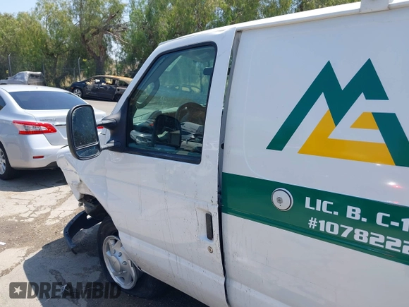 2011 Ford Econoline Cargo Commercial with VIN 1FTNE2EL1BDA44493, listed as a IAAI auction lot 42118629 with 63,526 mi miles and . Bid and sale history available at DreamBid. Image 19.