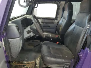 2004 Jeep Wrangler X with VIN 1J4FA39S64P734226, listed as a Copart auction lot 59389795 with 107,373 mi miles and Clean title. Bid and sale history available at DreamBid. Image 7.