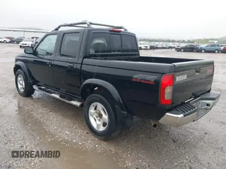 2000 Nissan Frontier XE z VIN 1N6ED27Y4YC355942, wystawiony jako IAAI lot #42162996 z przebiegiem 278 251 mil mil oraz . Historia ofert i sprzedaży dostępna na DreamBid. Obrazek 3.