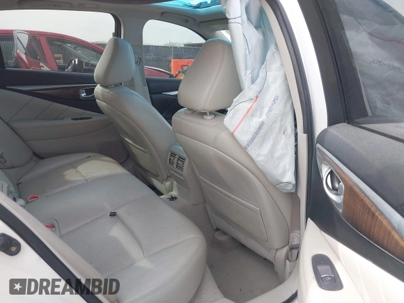 2015 Infiniti Q50 z VIN JN1BV7APXFM335981, wystawiony jako IAAI lot #41718555 z przebiegiem 83 918 mil mil oraz . Historia ofert i sprzedaży dostępna na DreamBid. Obrazek 8.