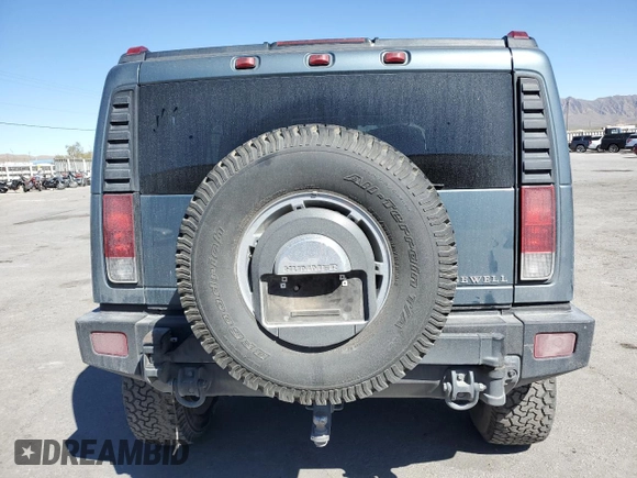 2006 Hummer H2 with VIN 5GRGN23U36H103240, listed as a Copart auction lot 72084594 with 130,814 mi miles and Salvage Title. Bid and sale history available at carsss.com. Image 6.