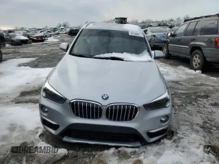 2018 BMW X1 sDrive28i with VIN WBXHU7C32J5H44215, listed as a Copart auction lot 87356474 with 121,828 mi miles and Salvage Title. Bid and sale history available at carsss.com. Image 5.