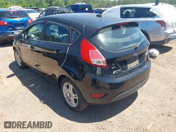 2019 Ford Fiesta SE z VIN 3FADP4EJ0KM125724, wystawiony jako IAAI lot #42320657 z przebiegiem 53 728 mil mil oraz . Historia ofert i sprzedaży dostępna na DreamBid. Obrazek 3.