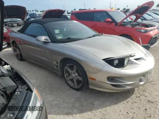 2002 Pontiac Firebird Trans Am z VIN 2G2FV32G022171702, wystawiony jako Copart lot #74819264 z przebiegiem Nie podano mil oraz Nie do naprawy • Non repairable. Historia ofert i sprzedaży dostępna na DreamBid. Obrazek 4.