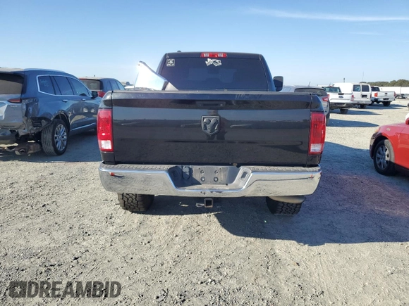 2018 Ram 1500 Tradesman z VIN 1C6RR7ST7JS102633, wystawiony jako Copart lot #72438884 z przebiegiem 84 725 mil mil oraz Szkoda całkowita • Salvage title. Historia ofert i sprzedaży dostępna na DreamBid. Obrazek 6.