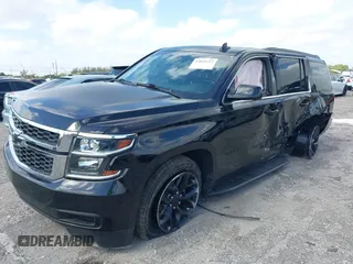 2017 Chevrolet Tahoe LS with VIN 1GNSCAKC1HR225698, listed as a IAAI auction lot 42044712 with 89,605 mi miles and . Bid and sale history available at DreamBid. Image 2.
