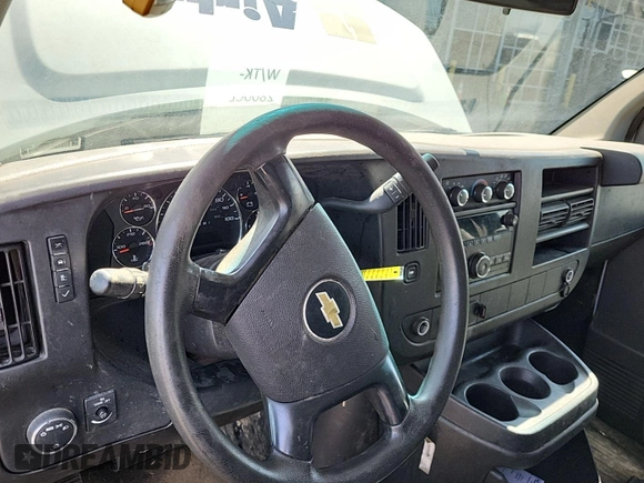 2014 Chevrolet Express Cargo with VIN 1GCWGFBA2E1171252, listed as a IAAI auction lot 42207161 with 200,713 mi miles. Bid and sale history available at carsss.com. Image 1.
