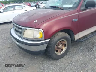 1997 Ford F-150 with VIN 1FTDF1720VNB30982, listed as a IAAI auction lot 42764577 with 296,424 mi miles and . Bid and sale history available at DreamBid. Image 6.