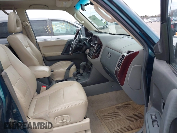 2002 Mitsubishi Montero Limited z VIN JA4MW51R82J003116, wystawiony jako IAAI lot #41954991 z przebiegiem 223 784 mil mil oraz . Historia ofert i sprzedaży dostępna na DreamBid. Obrazek 5.