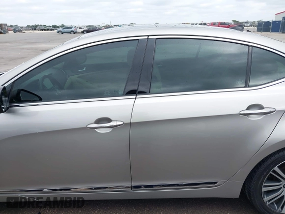 2014 Kia Cadenza Limited with VIN KNALN4D71E5137744, listed as a IAAI auction lot 42063014 with 61,310 mi miles. Bid and sale history available at carsss.com. Image 14.