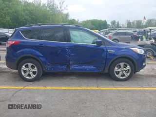 2014 Ford Escape SE z VIN 1FMCU9G94EUD88632, wystawiony jako IAAI lot #42257383 z przebiegiem 150 934 mil mil oraz . Historia ofert i sprzedaży dostępna na DreamBid. Obrazek 13.