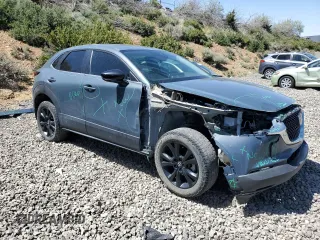 2023 Mazda CX-30 S Carbon Edition with VIN 3MVDMBCM1PM524019, listed as a Copart auction lot 57079355 with 46,737 mi miles and Salvage title. Bid and sale history available at DreamBid. Image 4.