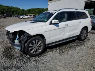 2016 Mercedes-Benz GL with VIN 4JGDF6EE3GA690348, listed as a Copart auction lot 60999894 with 143,623 mi miles and Salvage Title. Bid and sale history available at carsss.com. Image 1.