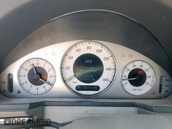 2005 Mercedes-Benz E 5.0L with VIN WDBUF70J95A718132, listed as a Copart auction lot 51620185 with 249,876 mi miles and Salvage Title. Bid and sale history available at carsss.com. Image 9.