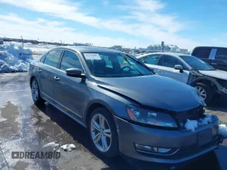 2014 Volkswagen Passat TDI SEL Premium with VIN 1VWCN7A31EC026030, listed as a IAAI auction lot 41734687 with 113,979 mi miles. Bid and sale history available at carsss.com. Image 1.