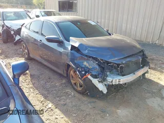 2020 Honda Civic LX with VIN 2HGFC2F67LH534381, listed as a IAAI auction lot 42056676 with 124,344 mi miles and . Bid and sale history available at DreamBid. Image 1.