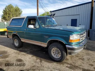 1996 Ford Bronco Custom with VIN 1FMEU15H4TLB59116, listed as a Copart auction lot 52989015 with 210,464 mi miles and Salvage title. Bid and sale history available at DreamBid. Image 4.