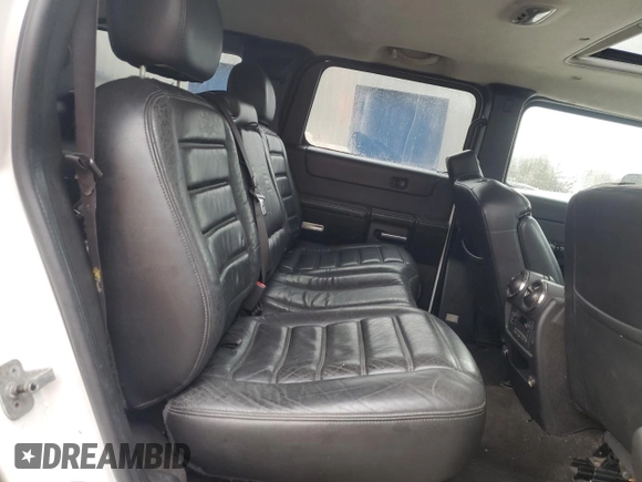 2006 Hummer H2 z VIN 5GRGN23UX6H104613, wystawiony jako Copart lot #51611815 z przebiegiem 186 543 mil mil oraz Szkody całkowita. Historia ofert i sprzedaży dostępna na DreamBid. Obrazek 11.