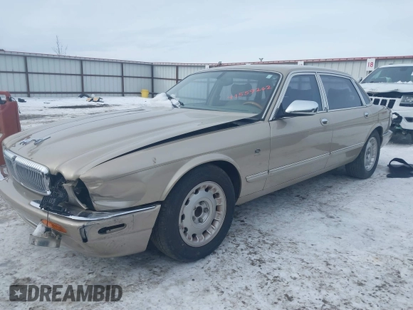 2000 Jaguar XJ Vanden Plas with VIN SAJDA24C7YLF13906, listed as a IAAI auction lot 41559262 with 122,586 mi miles and . Bid and sale history available at DreamBid. Image 2.