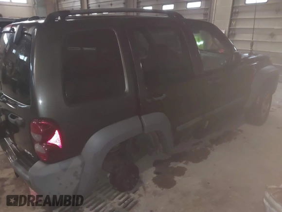 2005 Jeep Liberty Sport with VIN 1J4GL48KX5W691913, listed as a IAAI auction lot 41827572 with 169,313 mi miles and . Bid and sale history available at DreamBid. Image 4.
