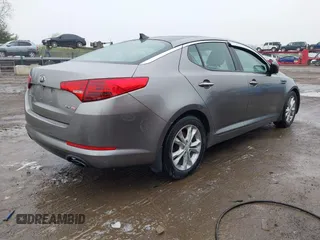 2013 Kia Optima EX z VIN 5XXGN4A72DG166687, wystawiony jako IAAI lot #41967631 z przebiegiem 202 712 mil mil oraz . Historia ofert i sprzedaży dostępna na DreamBid. Obrazek 4.